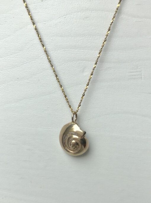 Reversible 14k gold seashell necklace with black diamond